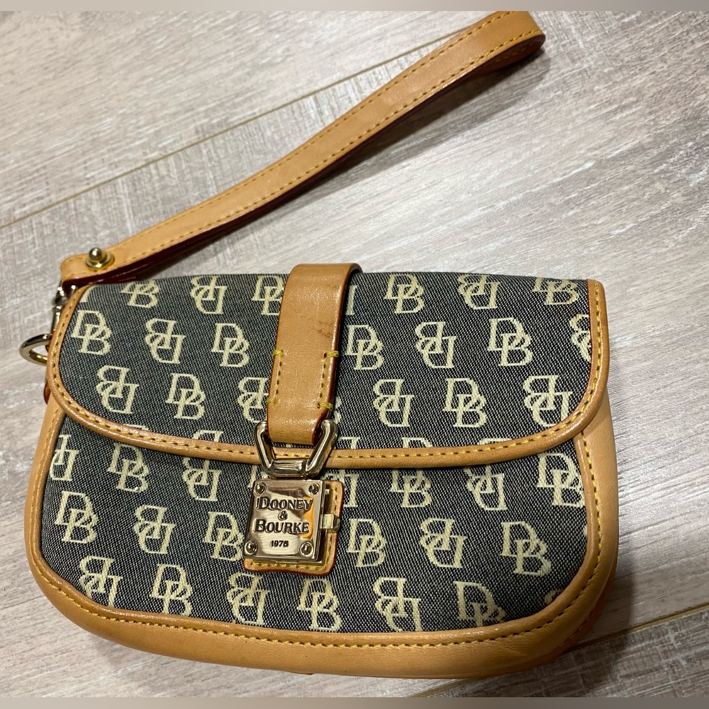 Authentic Dooney and Bourke Wristlet, Very Good Condition with Honey Patina